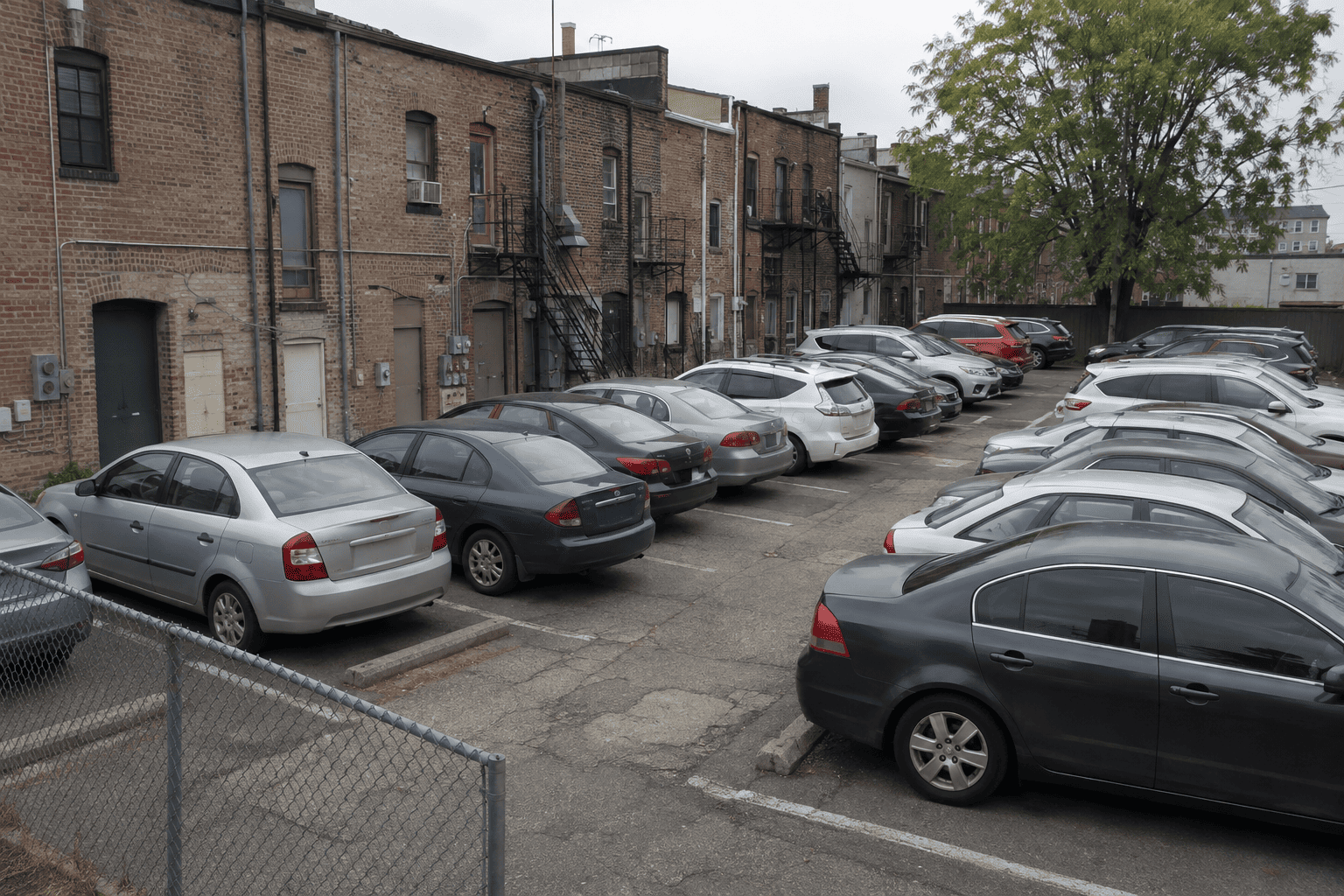 Cars parked in a municipal lot behind the shops off Cedar Lane in Teaneck, New Jersey