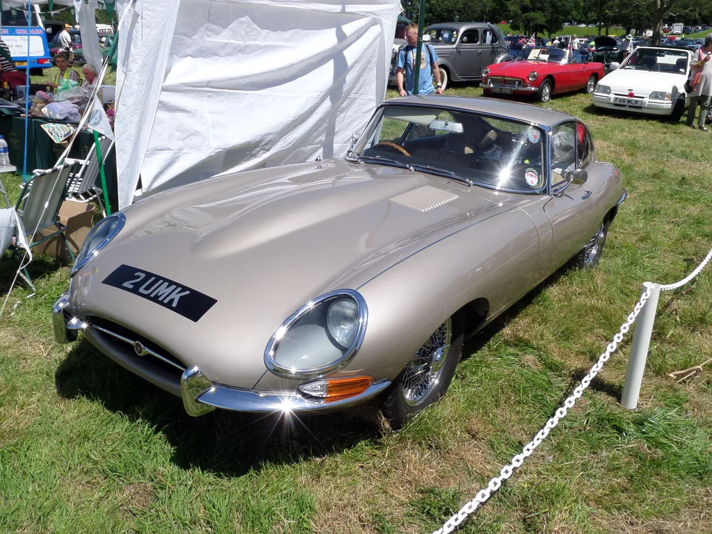 1966 Jaguar E-Type Series 1 4.2 Fixed Head Coupe — Opalescent Golden Sand